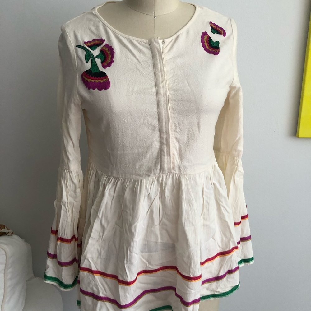 Embroidered Cream Blouse with floral accents and bell sleeves
